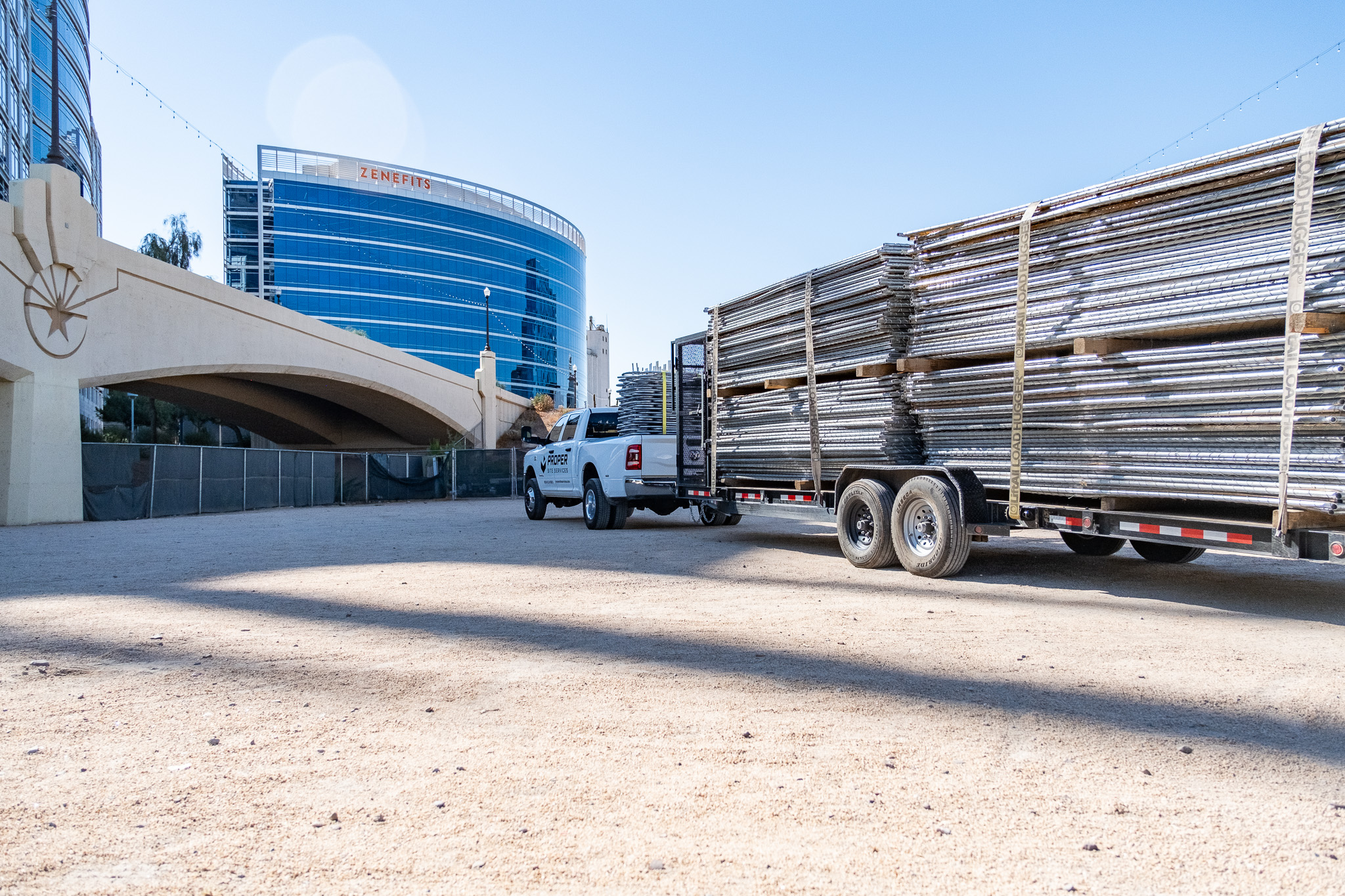 Proper Site Services delivering factory new temporary fence panels to a commercial project